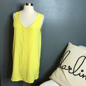 BB Dakota yellow cutout blouse size medium.